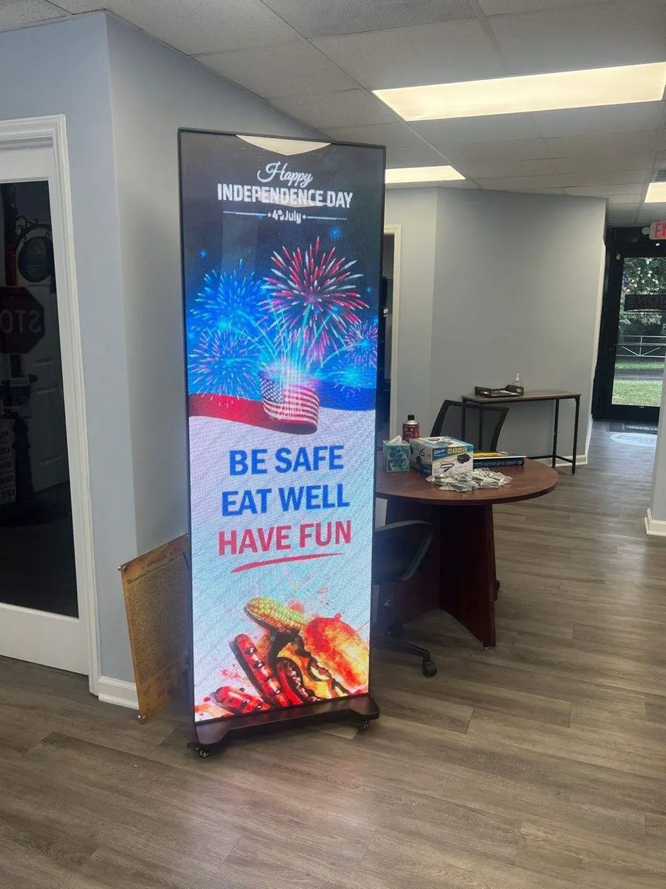 Freestanding indoor digital display showing restaurant information